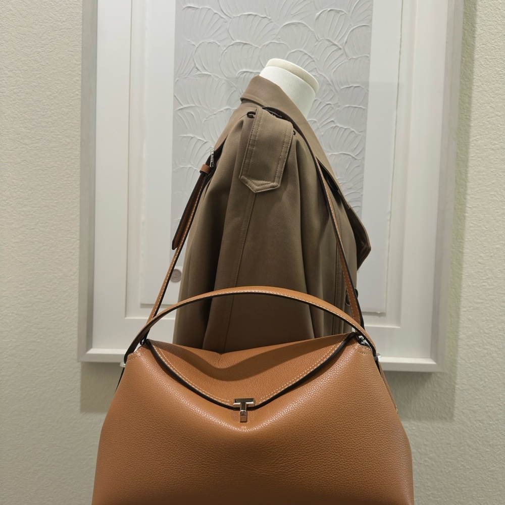 Toteme T-Lock grained leather top handle bag